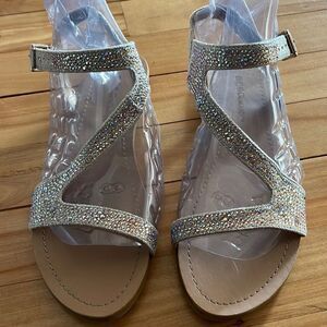 BCBGeneration gold sparkle studded flat strappy sandals. Buckle ankle strap. 6